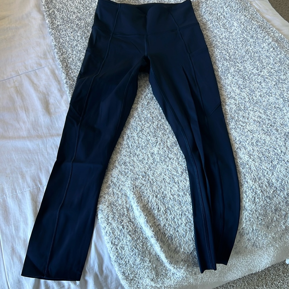 Lululemon Fast and Free high rise leggings with pockets. 23”, true navy color